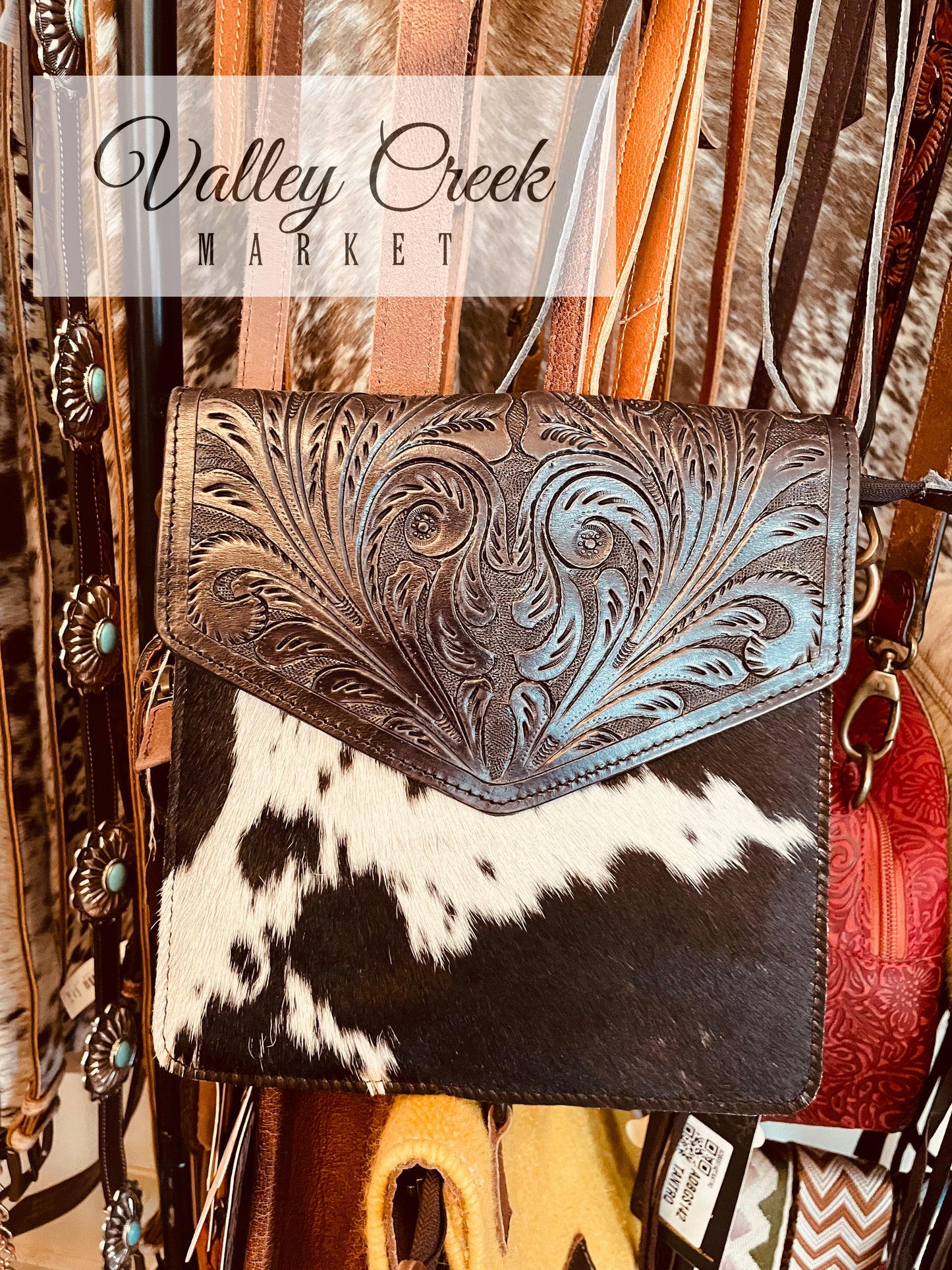 Black Cowhide and Tooled Leather Purse